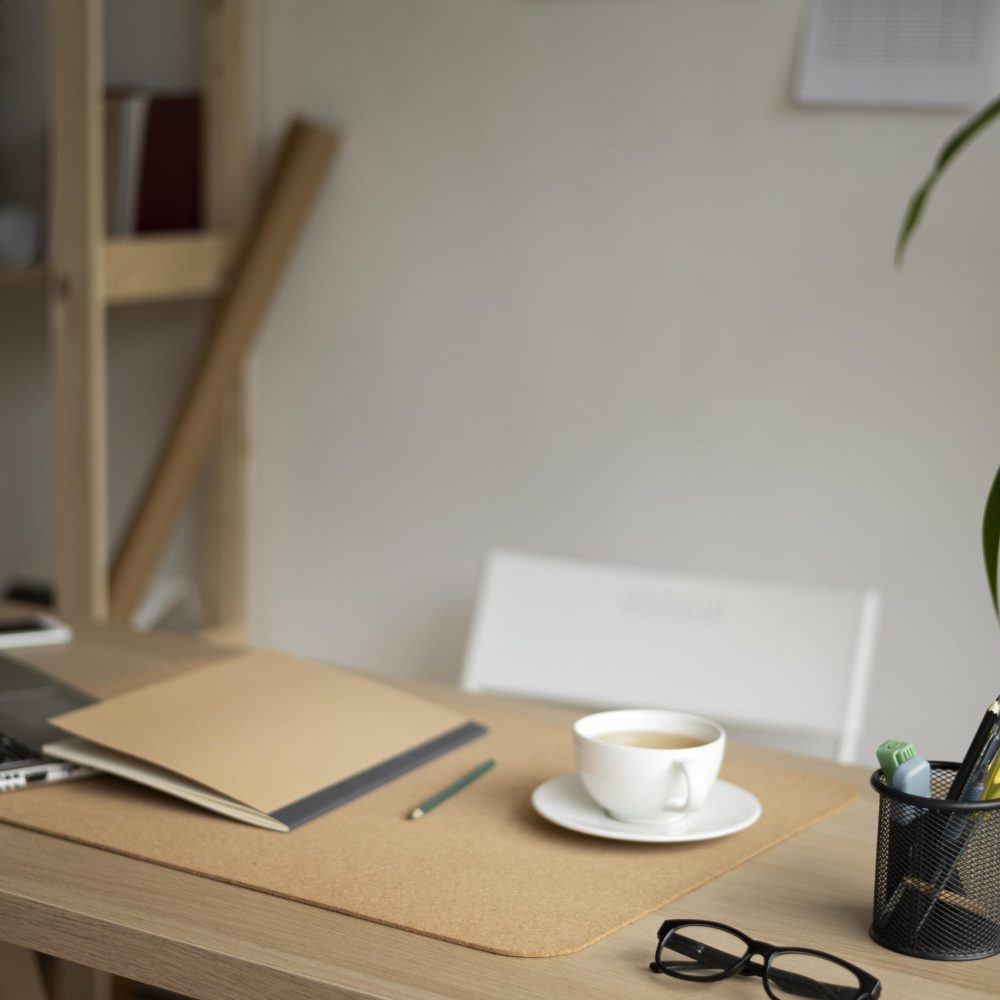 desk-arrangement-with-laptop-high-angle